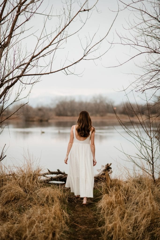 maternity session with a misty lake in the background
