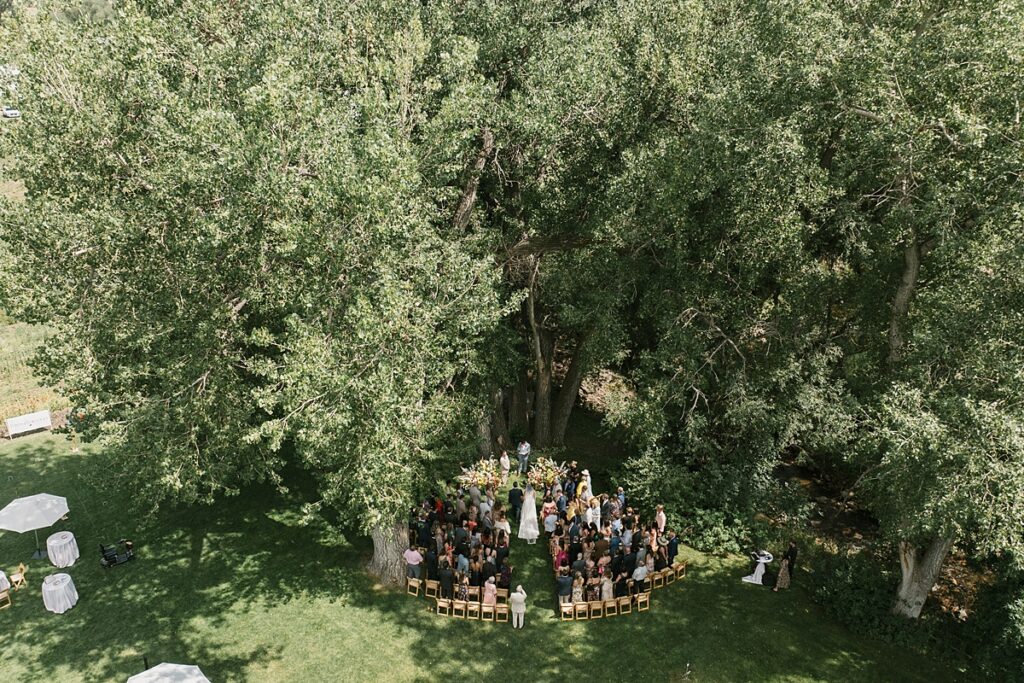 a drone shot above a ceremony during a Boulder Flower Farm wedding