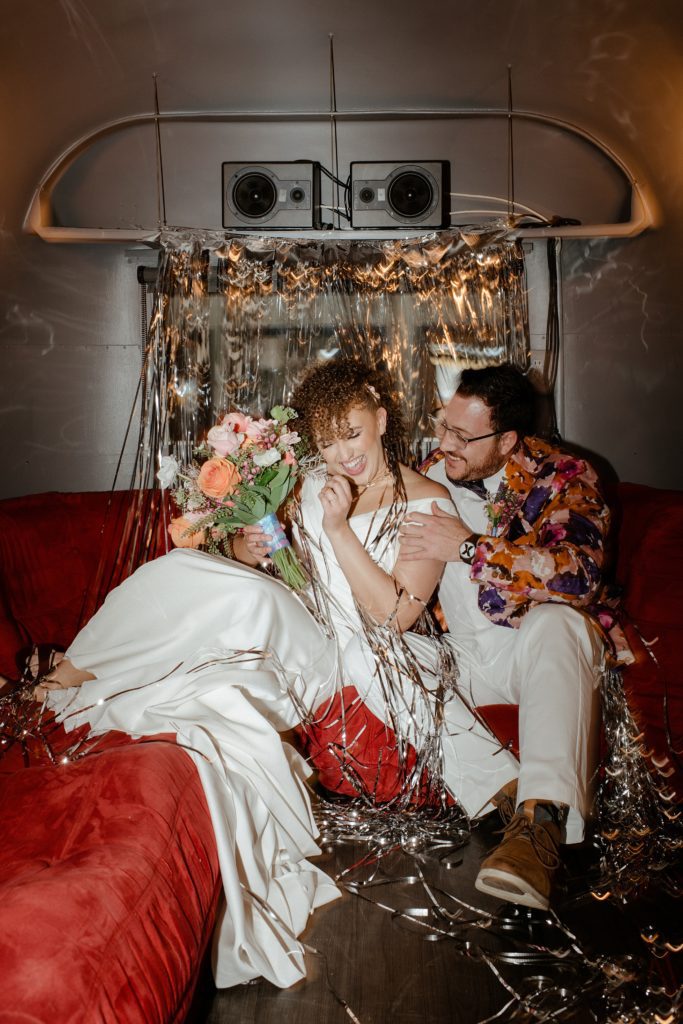 bride and groom inside the airstream at the Studio Boulder wedding venue