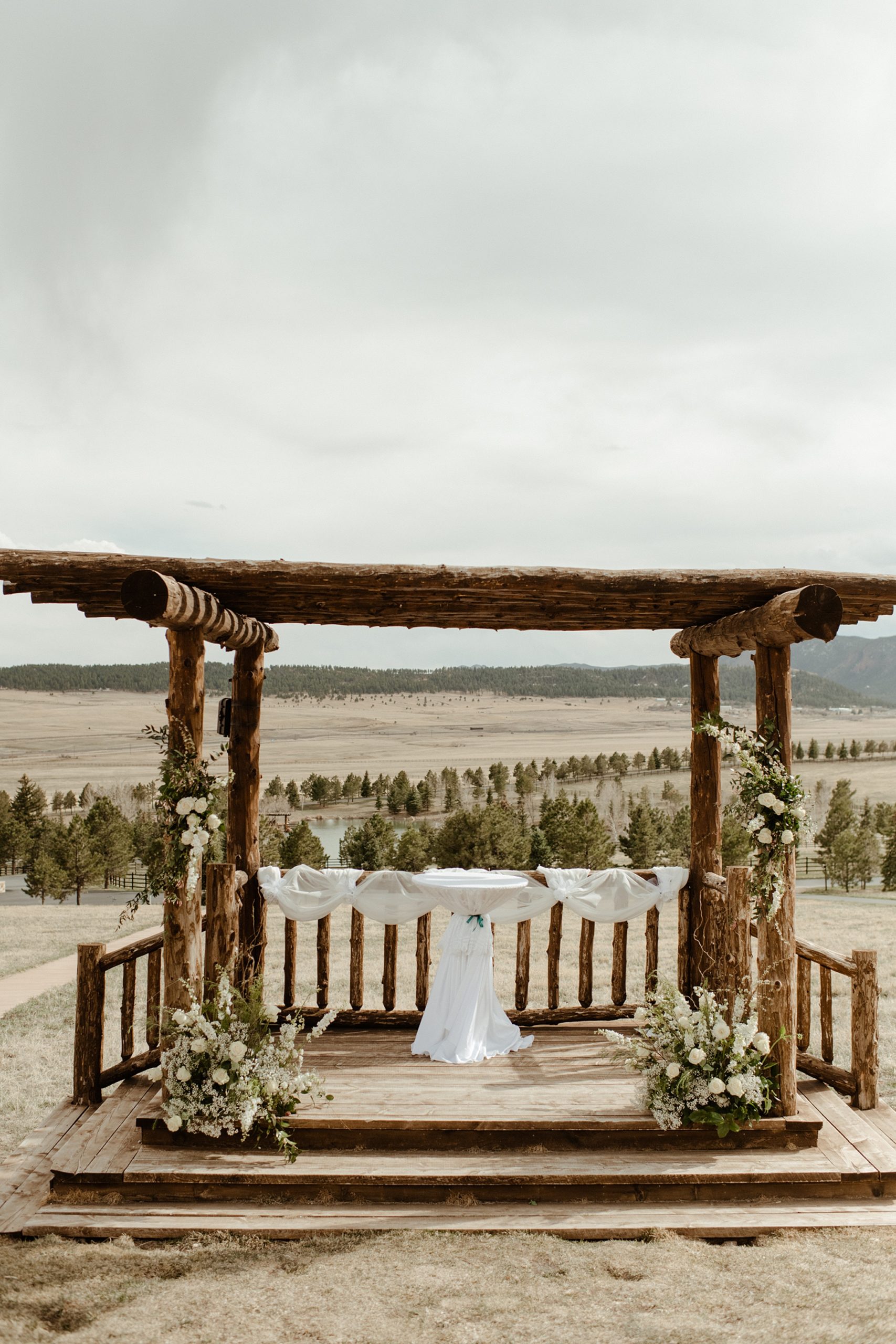 the alter on the mountainside of lower spruce mountain ranch wedding venue