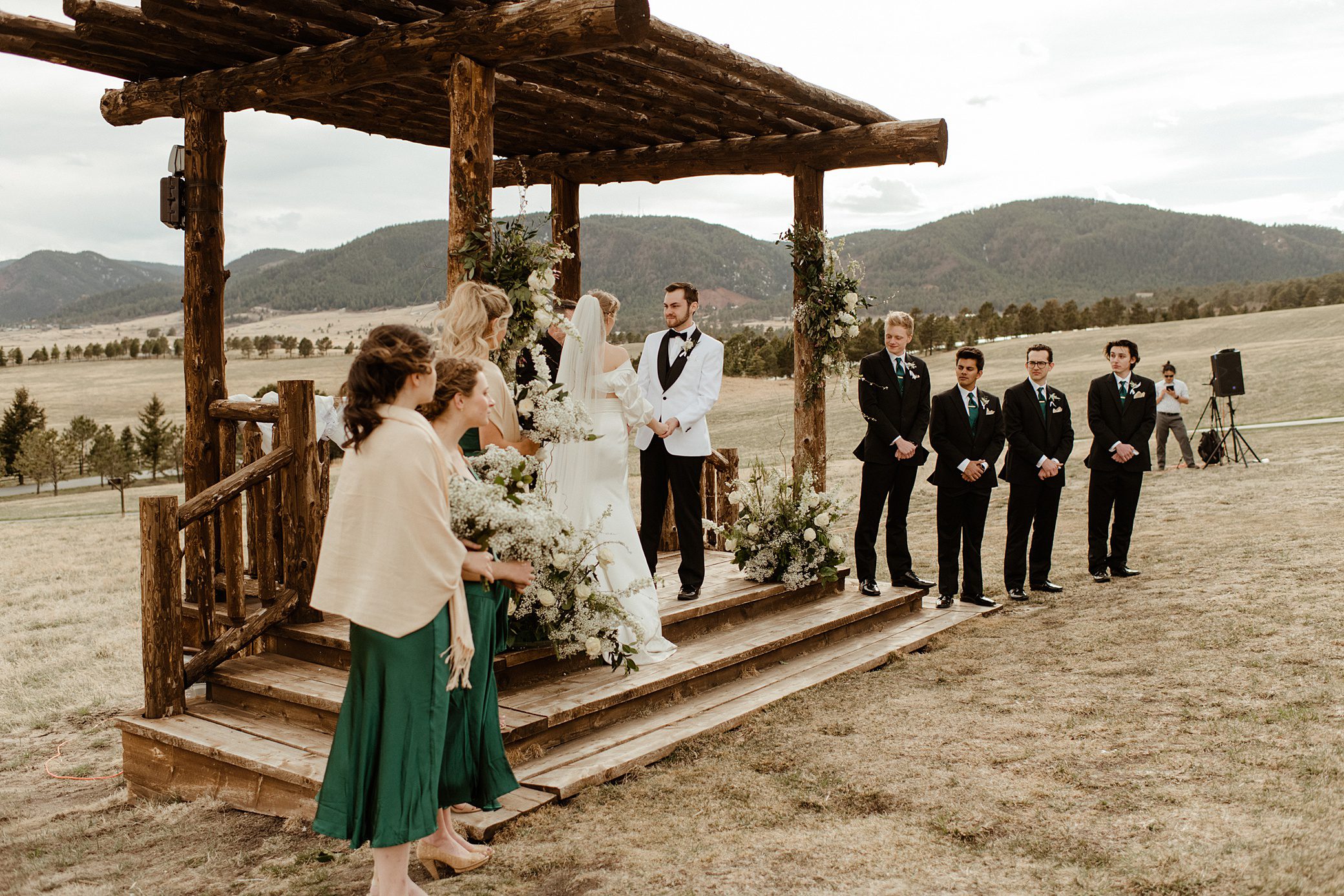 a wedding ceremony on the mountainside at Albert's Lodge wedding venue in Colorado
