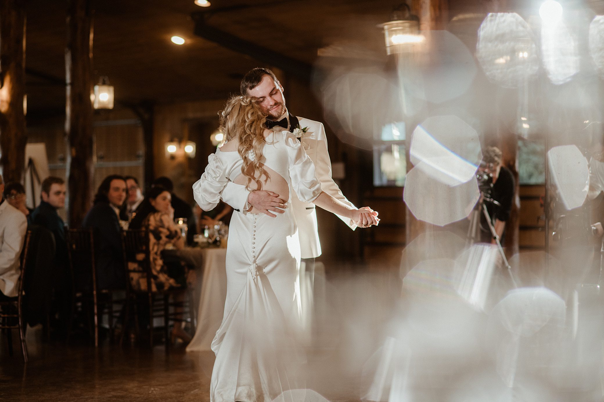 bride and groom share their first dance at theirAlbert's Lodge Wedding reception
