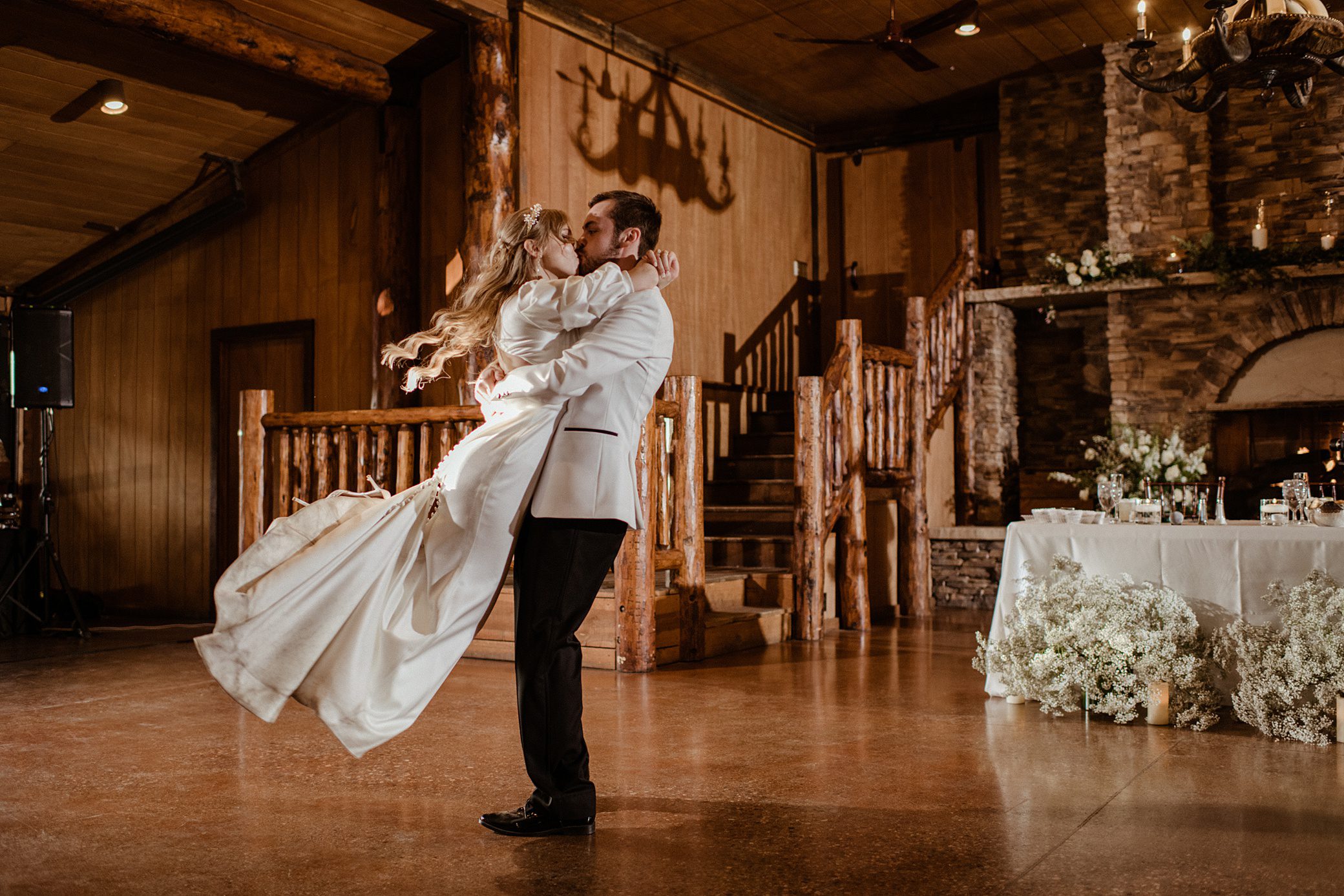 bride and groom share their first dance at the reception room of the Albert's Lodge Wedding venue
