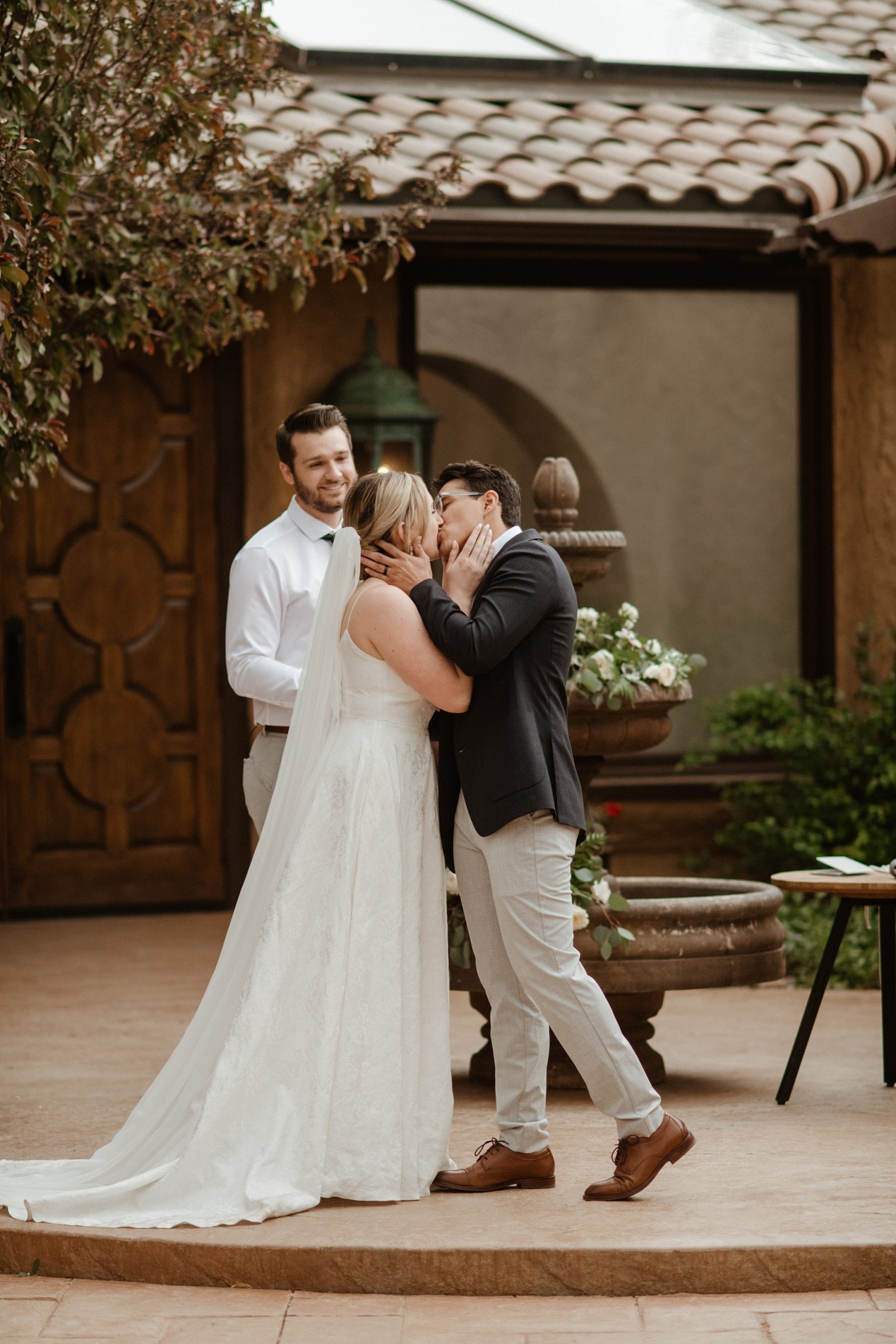 first kiss during an outdoor ceremony at a Villa Parker wedding