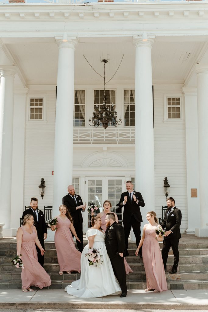 wedding party in front of the Manor House wedding venue