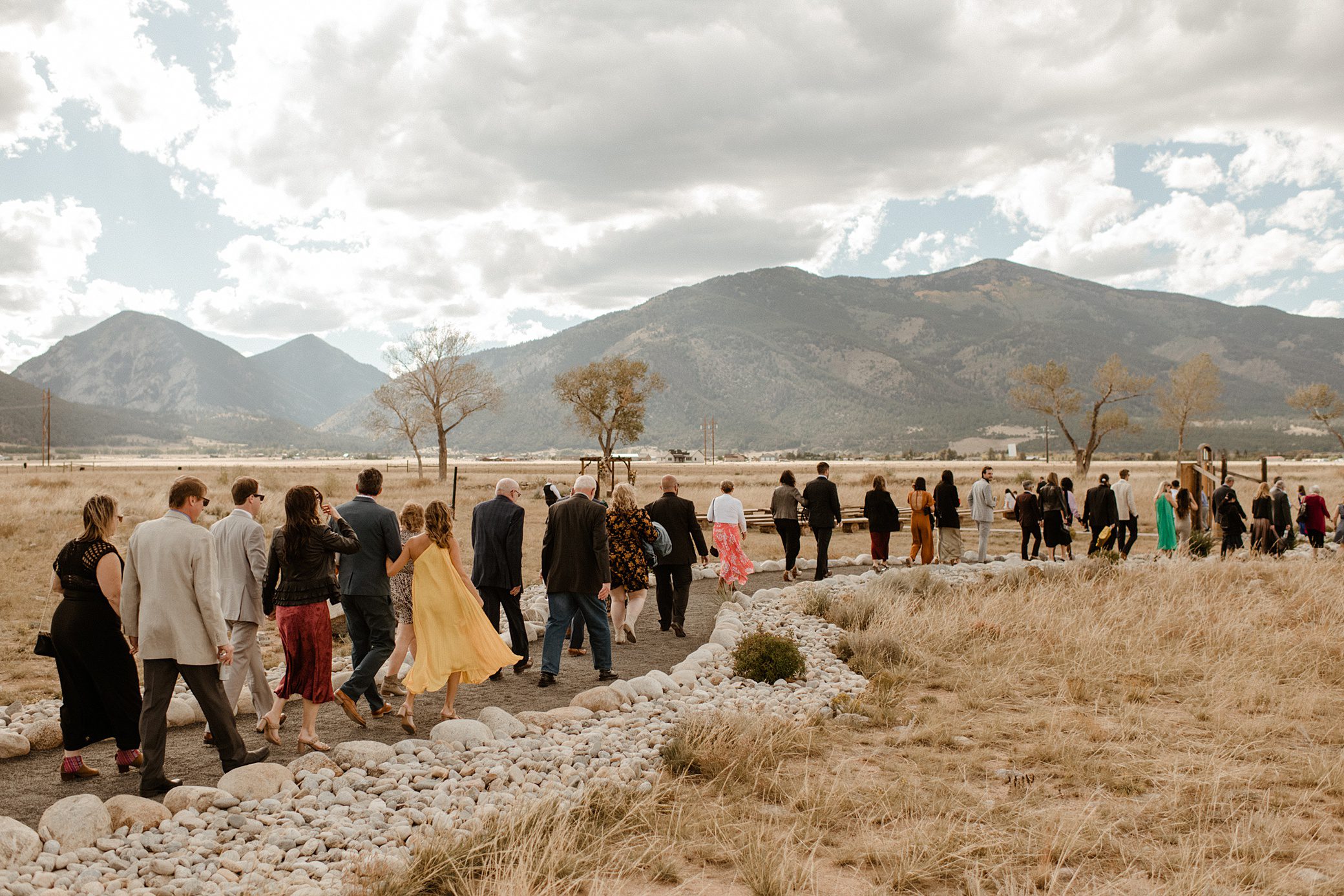 Guests are ushered to the ceremony sit at The Barn at Sunset Ranch in Buena Vista, Colorado