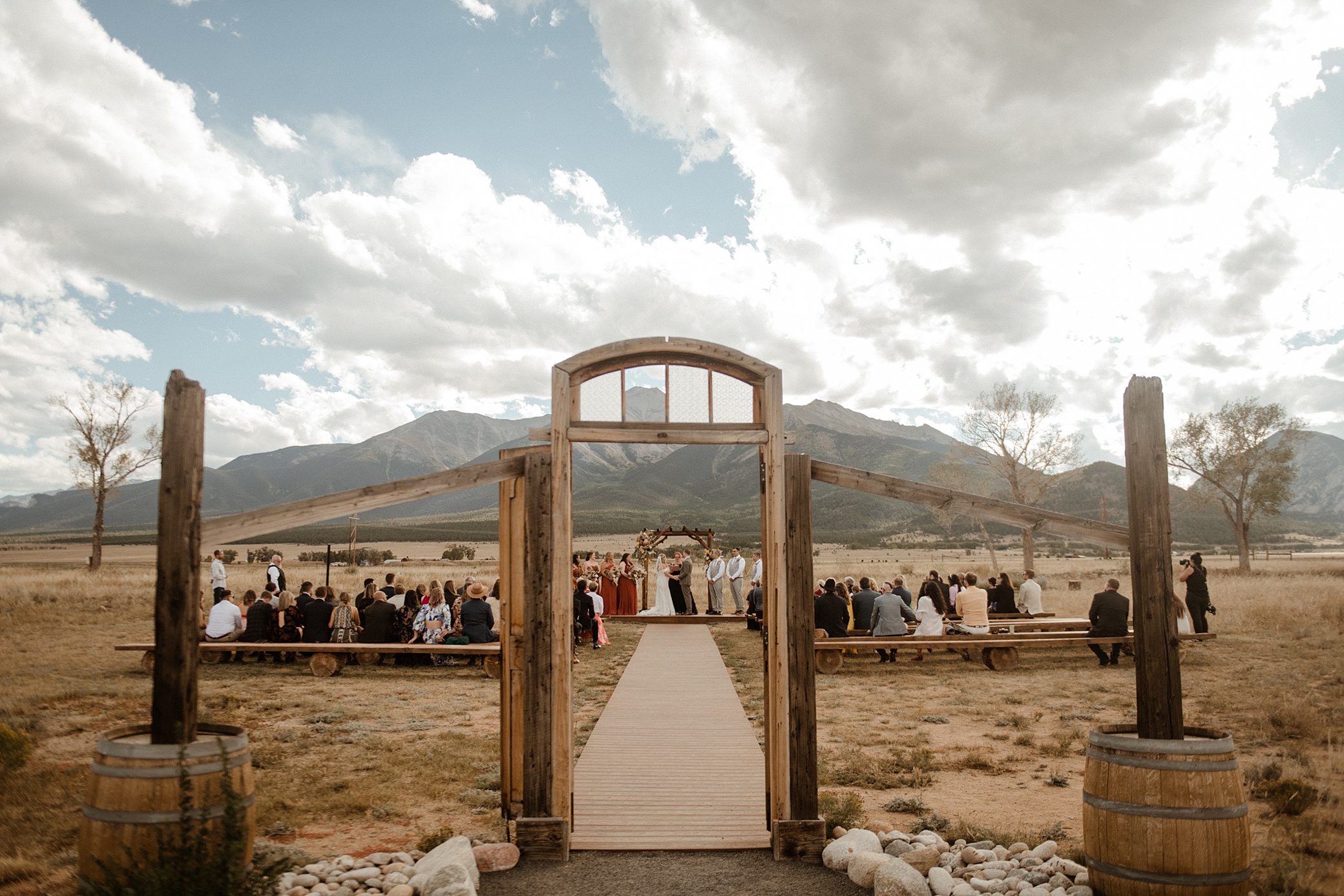 The ceremony sit at The Barn at Sunset Ranch in Buena Vista, Colorado