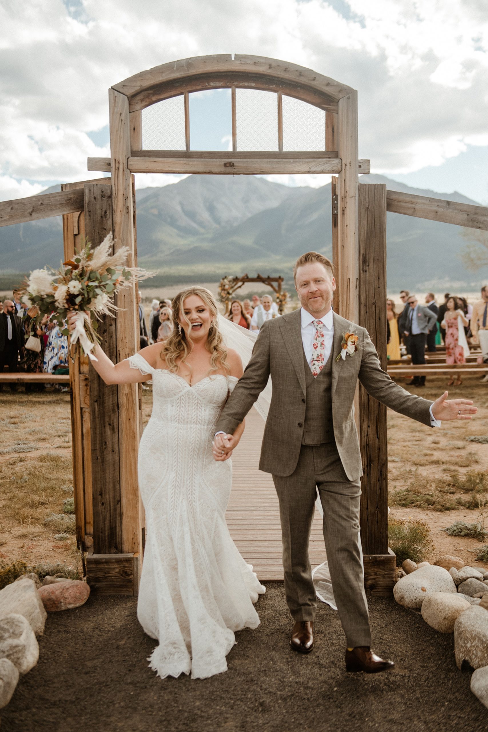 A wedding ceremony recessional at the Barn at Sunset Ranch in Buena Vista, CO