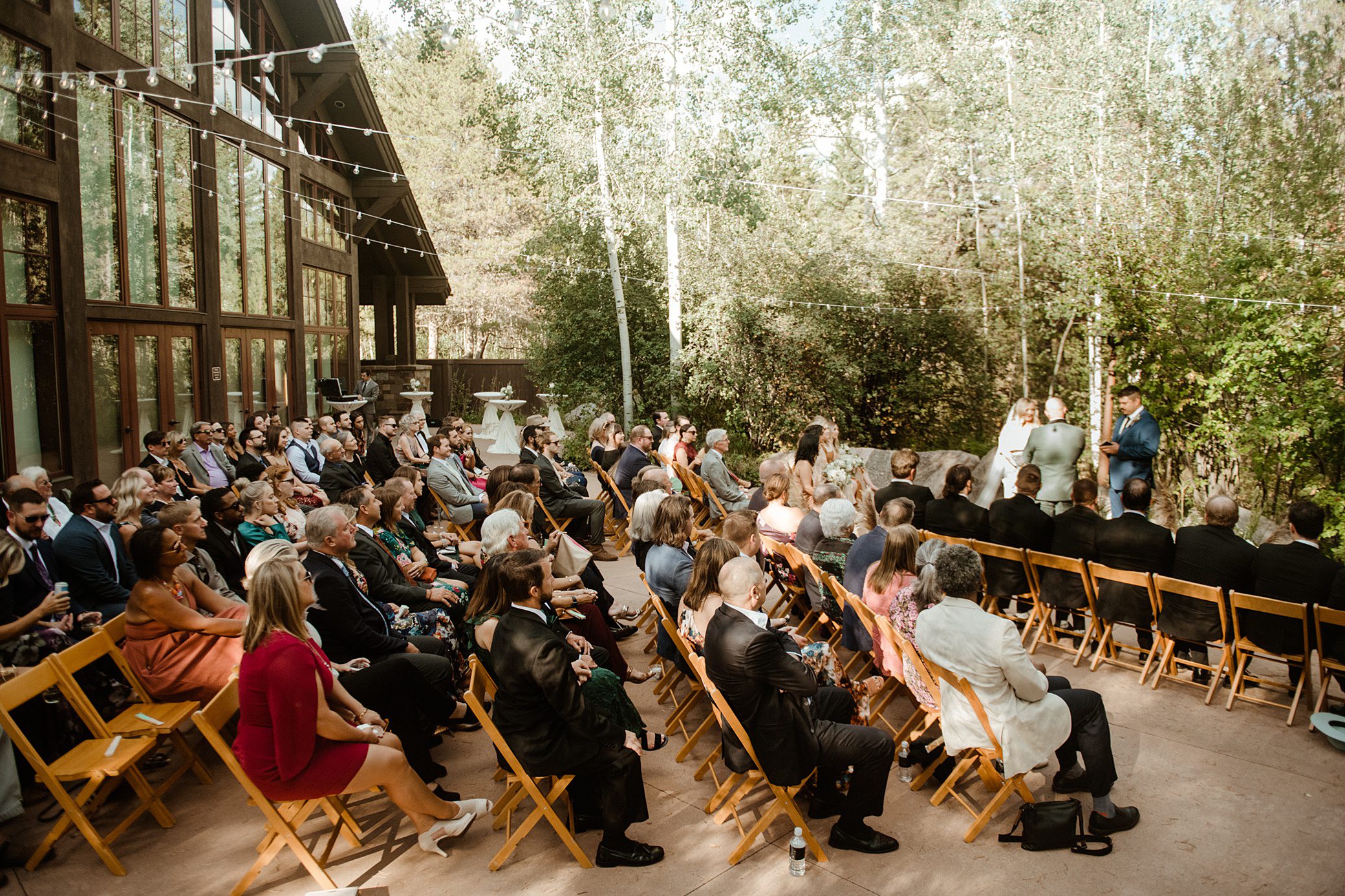 A wedding ceremony held in the patio of the Donovan Pavilion in Vail, Colorado