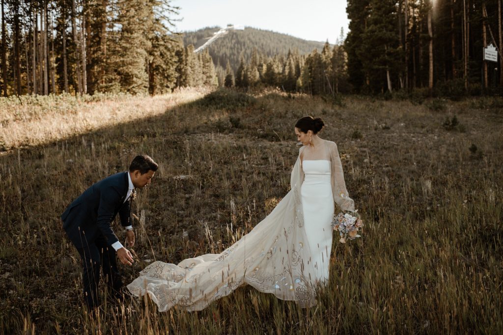 a bride and groom at sunset at the Ten Mile Station wedding venue in Breckenridge, Colorado