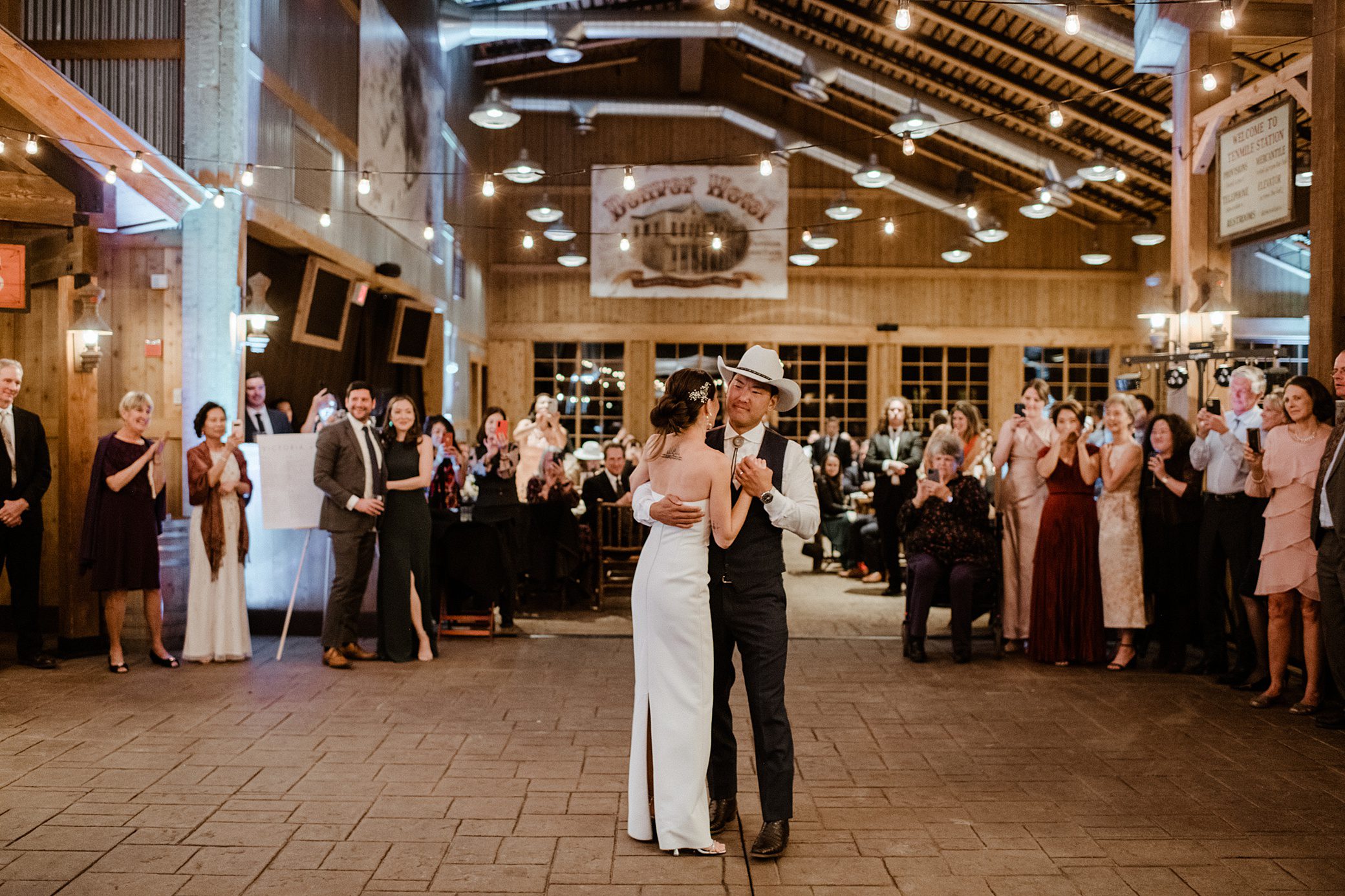 A bride and groom have their first dance at Ten Mile Station 