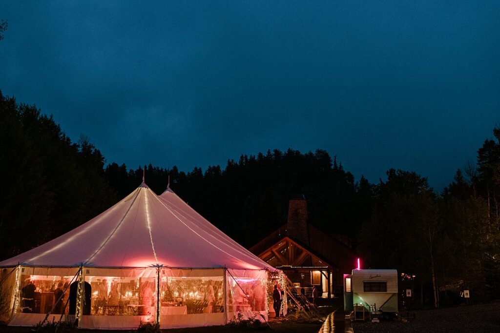 a night time view of the Blackstone Rivers Ranch wedding venue in Idaho Springs, Colorado
