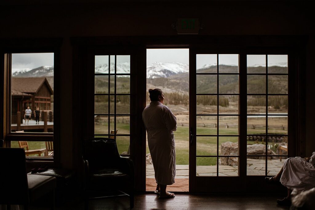 A bride getting ready in the Yager House for her Devil's Thumb Ranch wedding