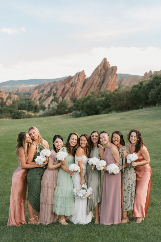 bridesmaids dressed in pastel before a Arrowhead Golf Course wedding
