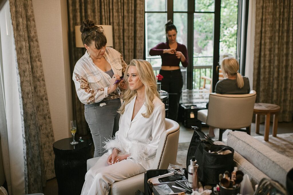 a bride getting ready for her Four Seasons Vail wedding