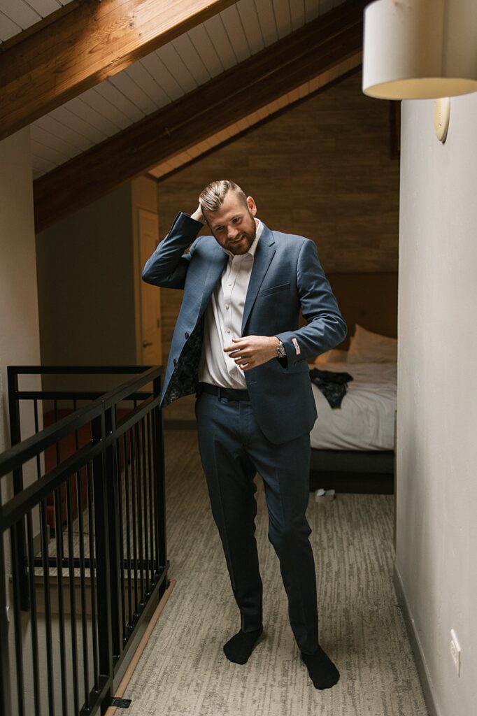 a groom getting ready before his Four Seasons Vail wedding