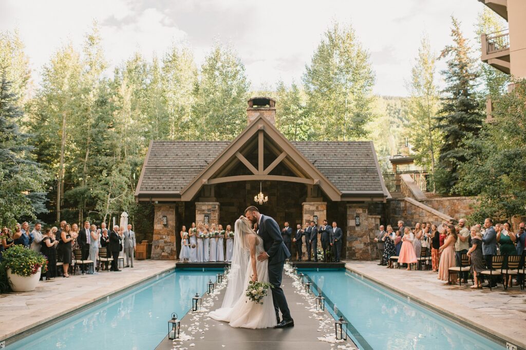 An overlook of a Four Seasons Vail wedding ceremony over the pool