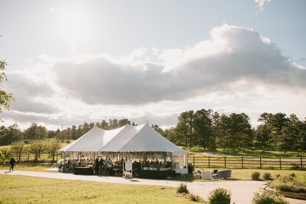 a view of the wedding tent outside of the Greystone Castle