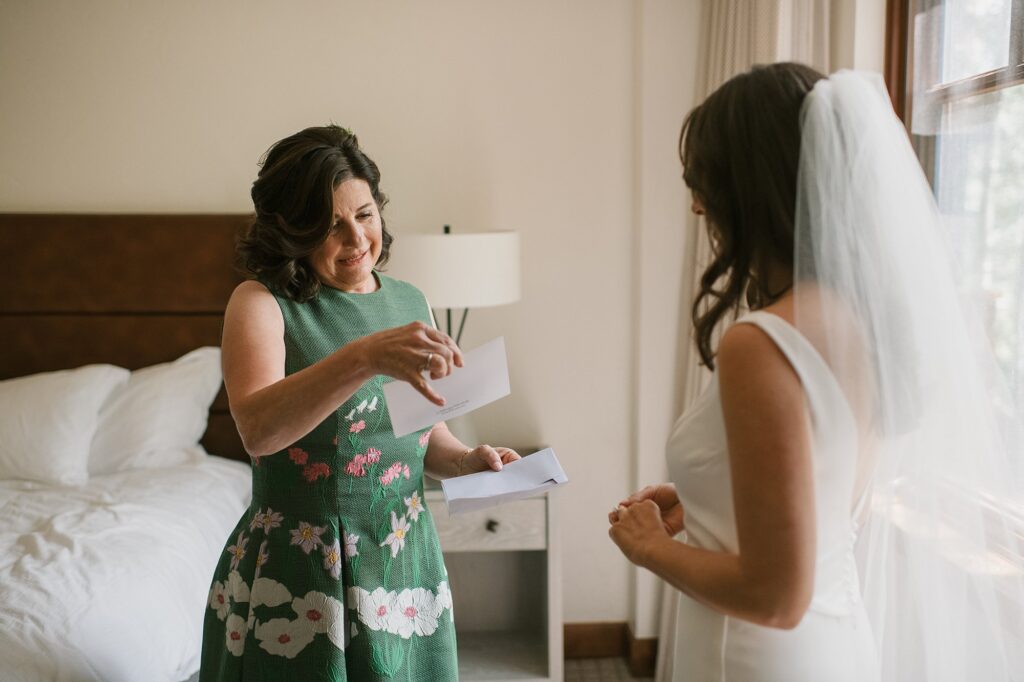 a bride surprises her mom with a pregnancy announcement before her Beaver Creek Intimate wedding
