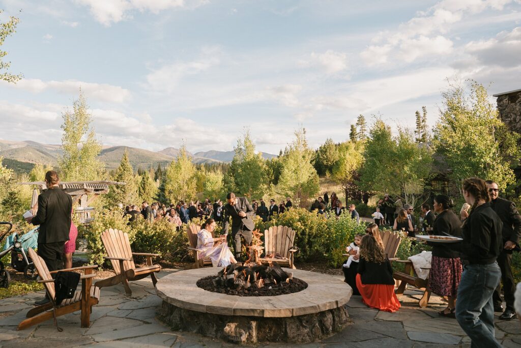 A devil's thumb ranch wedding reception set up with a lot of summer florals