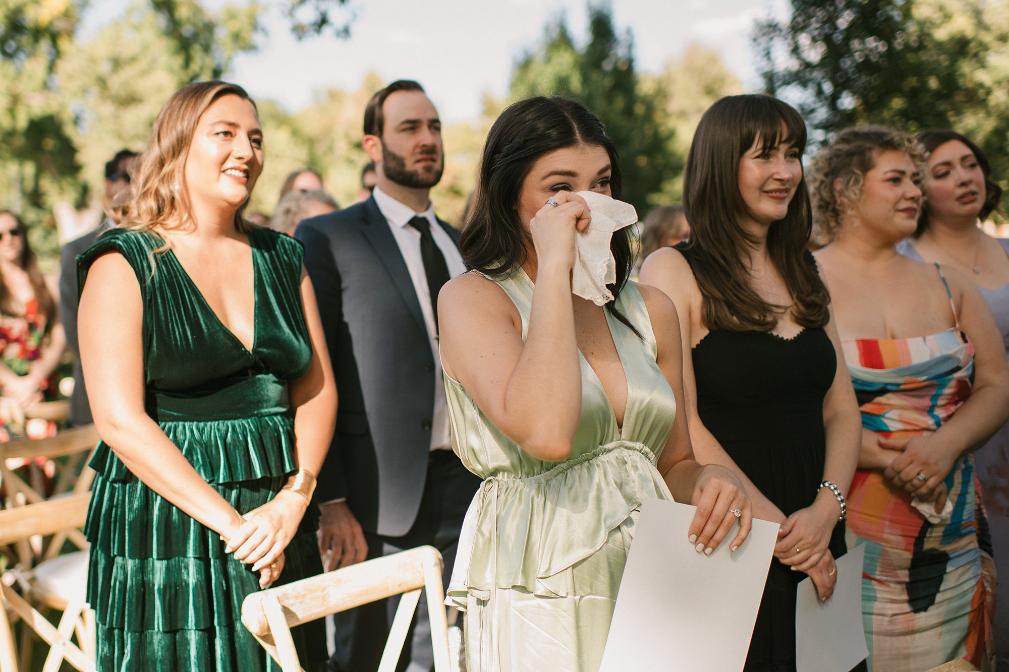 guests cry during a Washington Park Boathouse wedding in downtown Denver