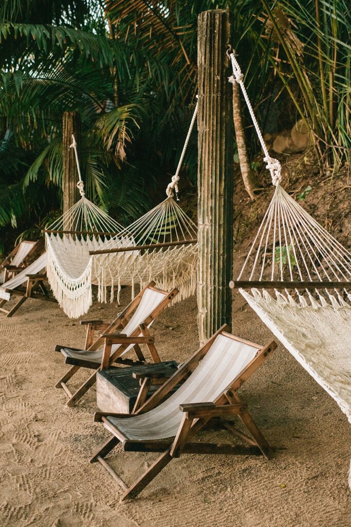 hammocks set up in the jungle on a private island Mexico wedding venue