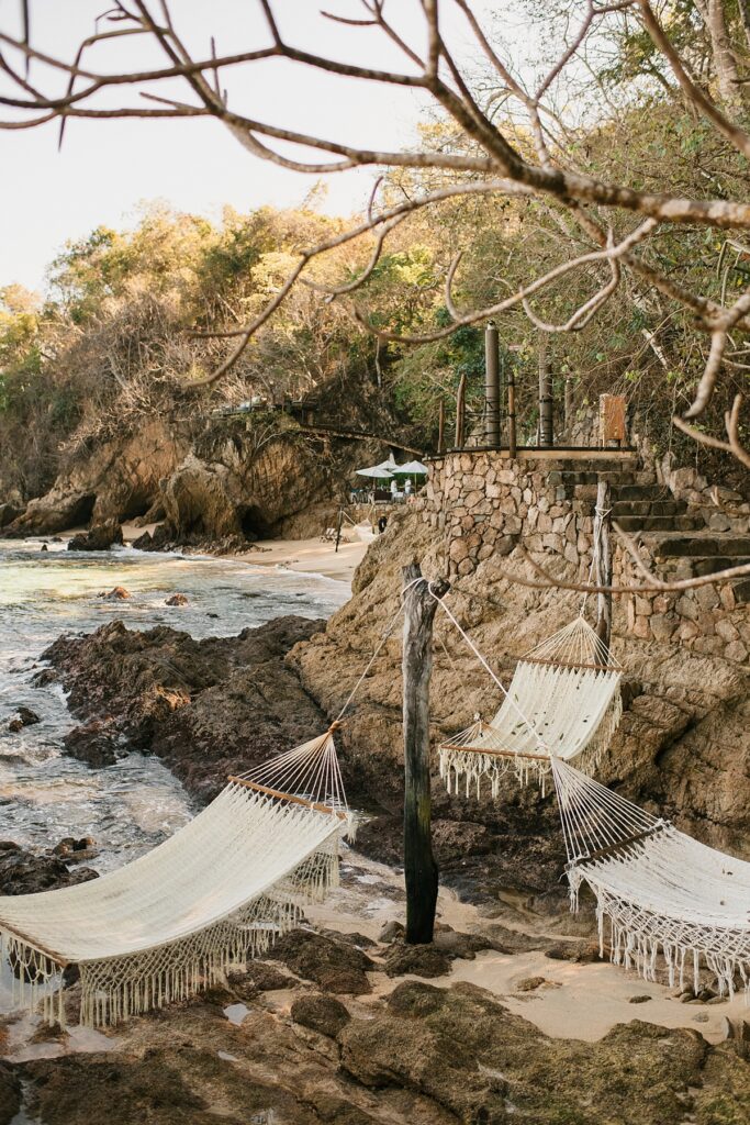 hammocks lay waiting for guests at this private island mexico wedding venue