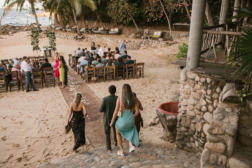 guests arrive by boat to a private island mexico wedding venue