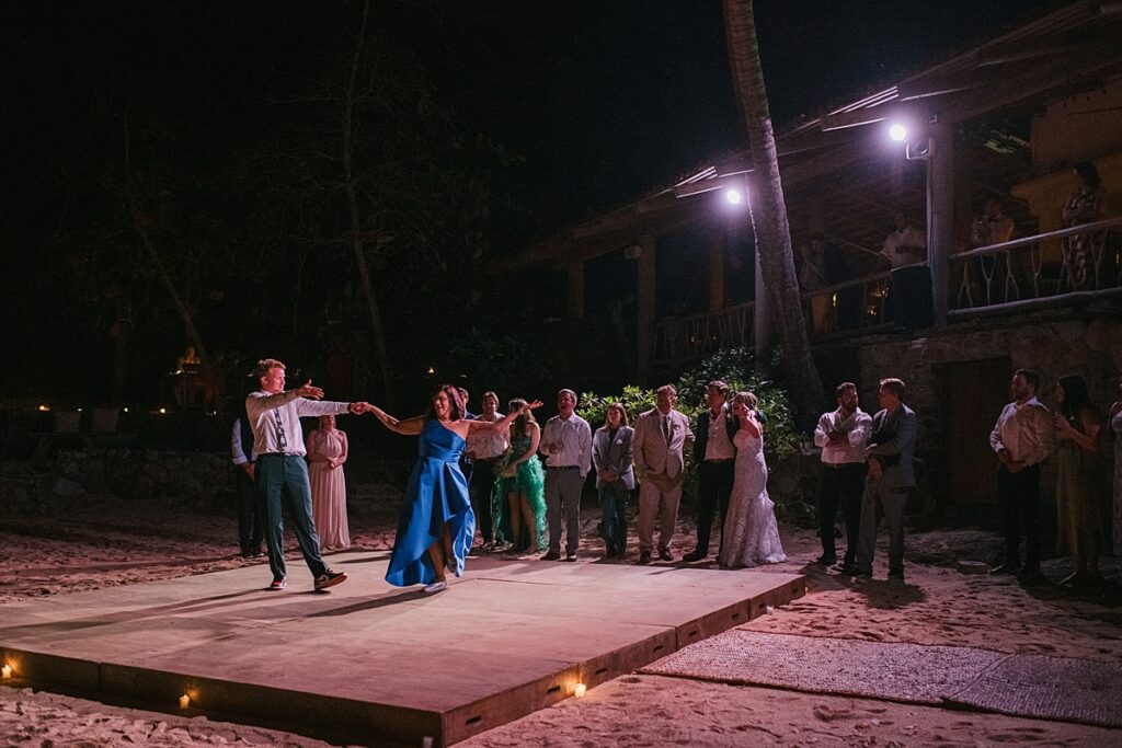 the late night dancing begins on the beach at a private island mexico wedding venue