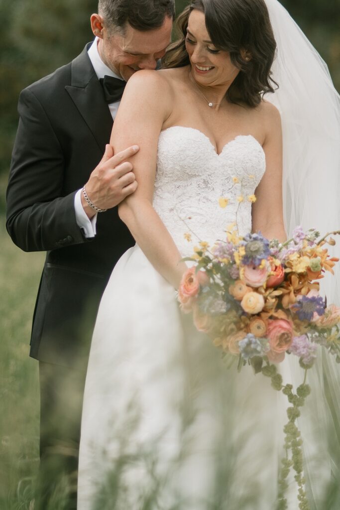 a bride and groom at Lower Spruce Mountain Ranch wedding venue