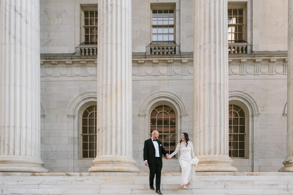 a Denver courthouse wedding with white columns and unique architecture