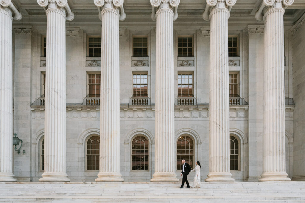 a Denver courthouse wedding with white columns and unique architecture