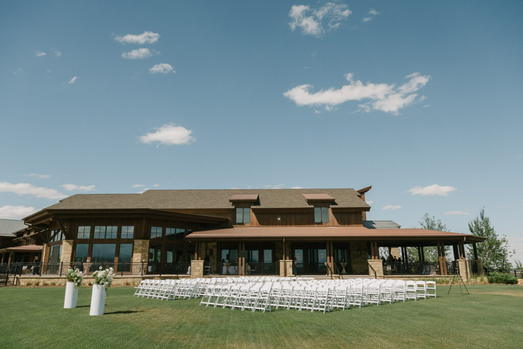 a ceremony set up for a TPC Colorado wedding on the lawn