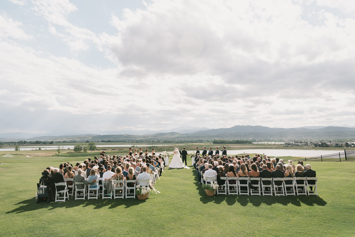 A perfect TPC Colorado wedding ceremony view in front of the Rocky Mountains